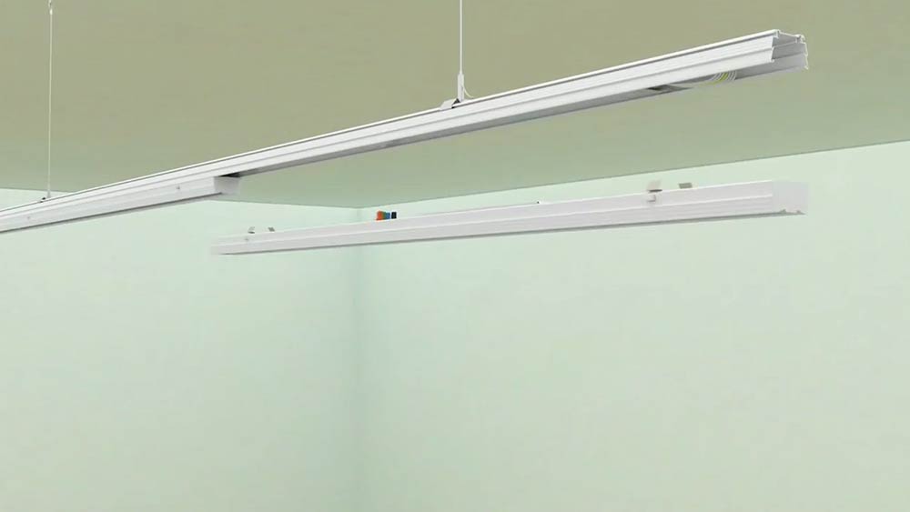 Push and fix the lamp body into the plug position of the trunking rail