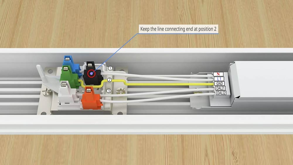 Slide the plug, select L1, L2, L3 Wire. Install the luminaire light body