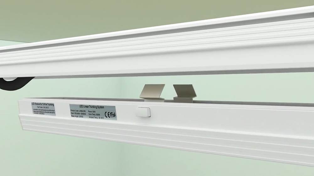 Push and fix the lamp body into the plug position of the trunking rail